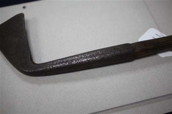 A rare 17th/18th century left handed spur toed golf club, length 42.5in.
